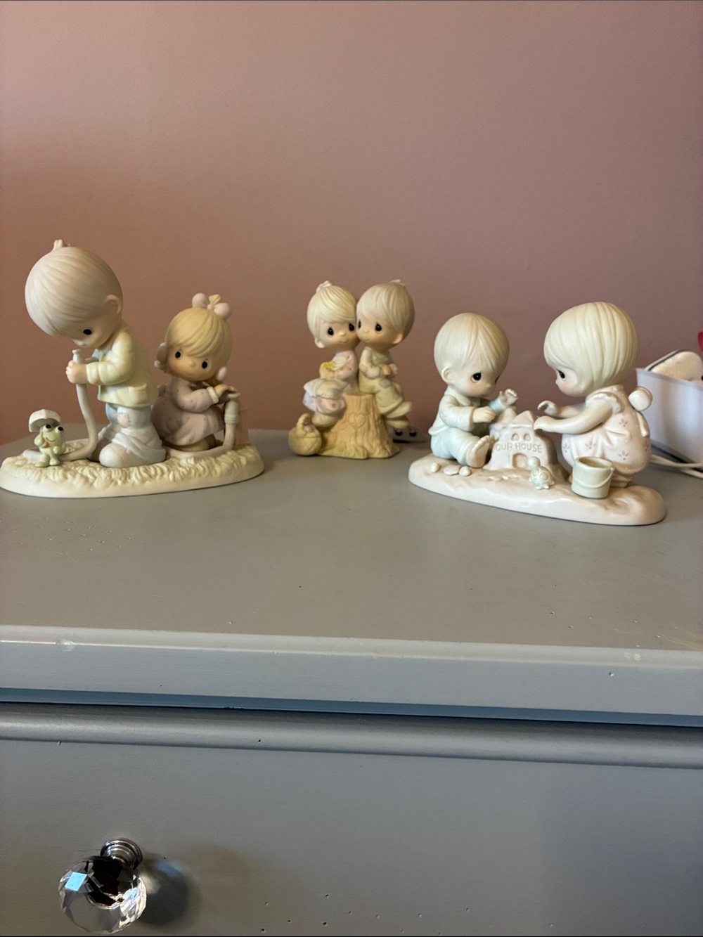 Precious Moments Cream and Pastel Figurine Collection